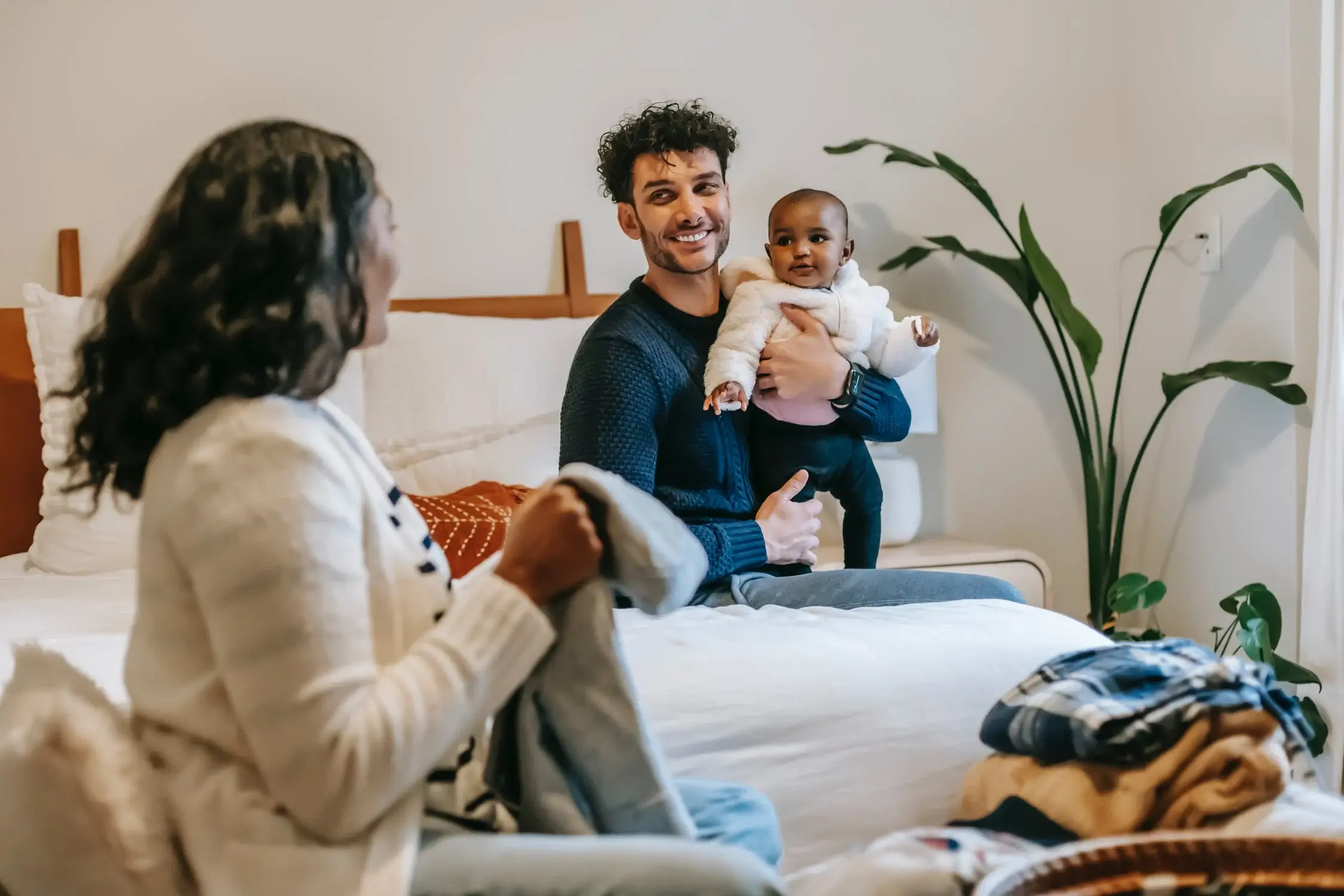 Family with newborn baby and lifestyle guide tips