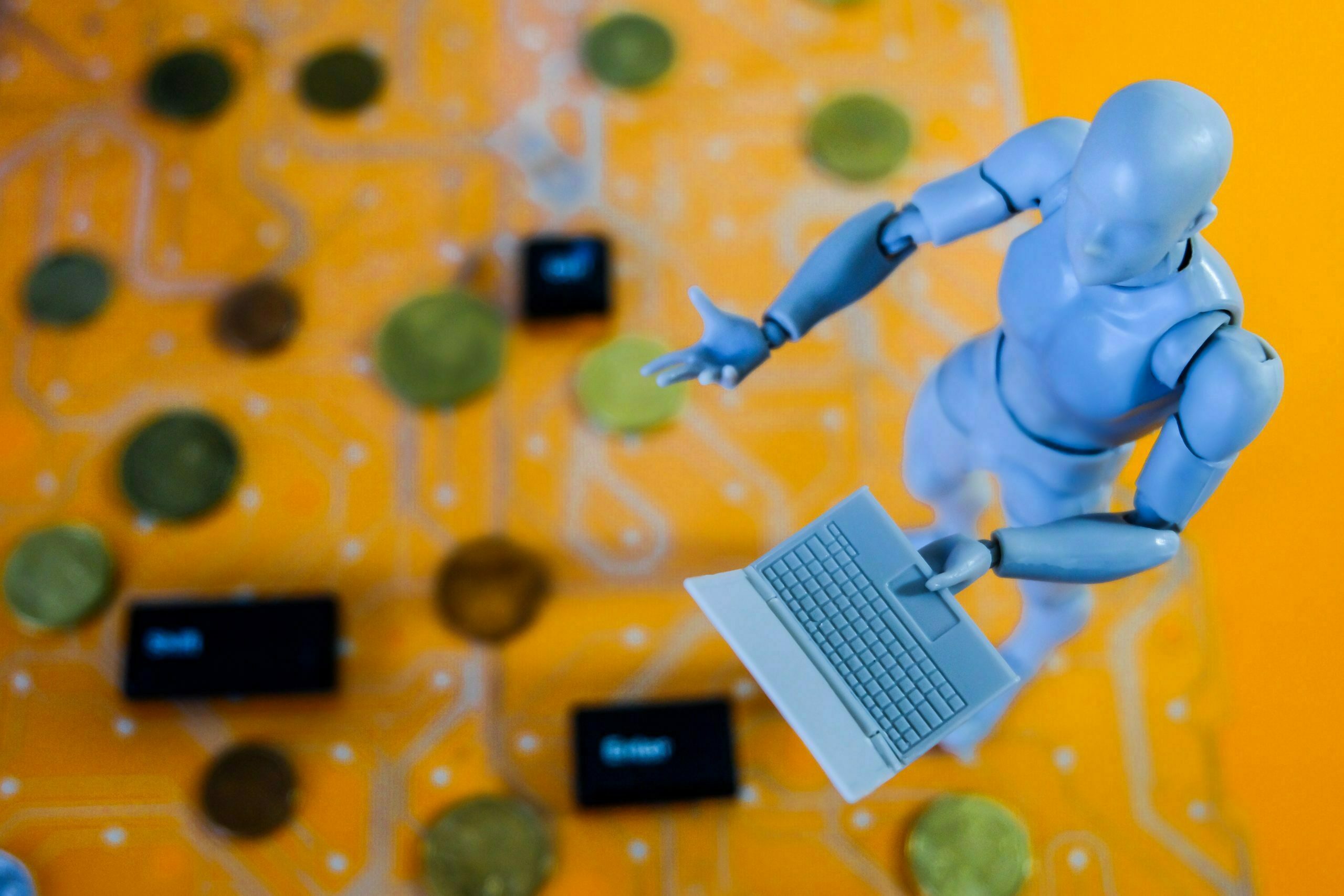 a toy figurine on a colorful surface