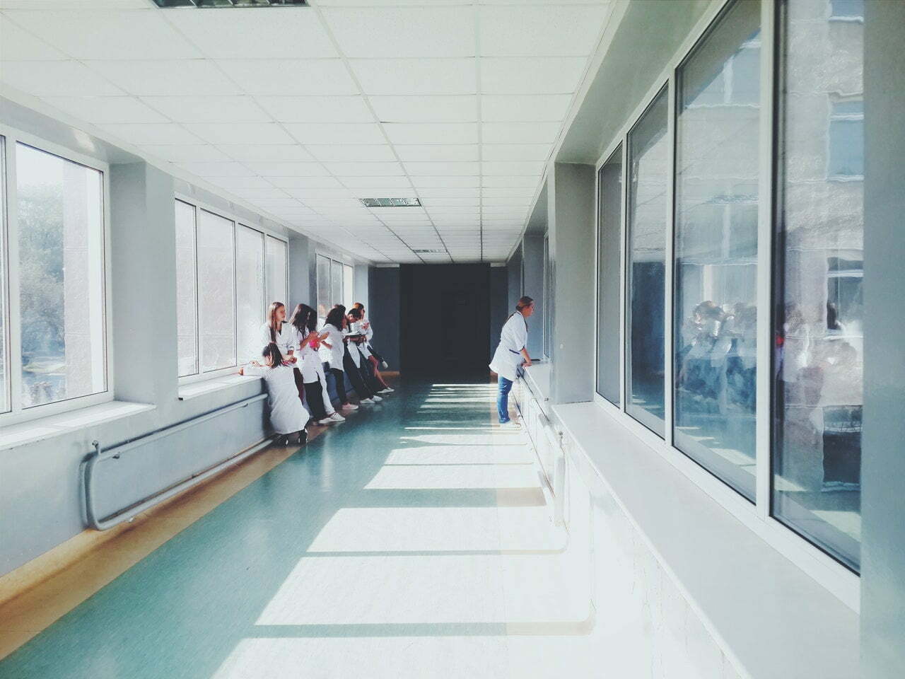 people standing on a walkway