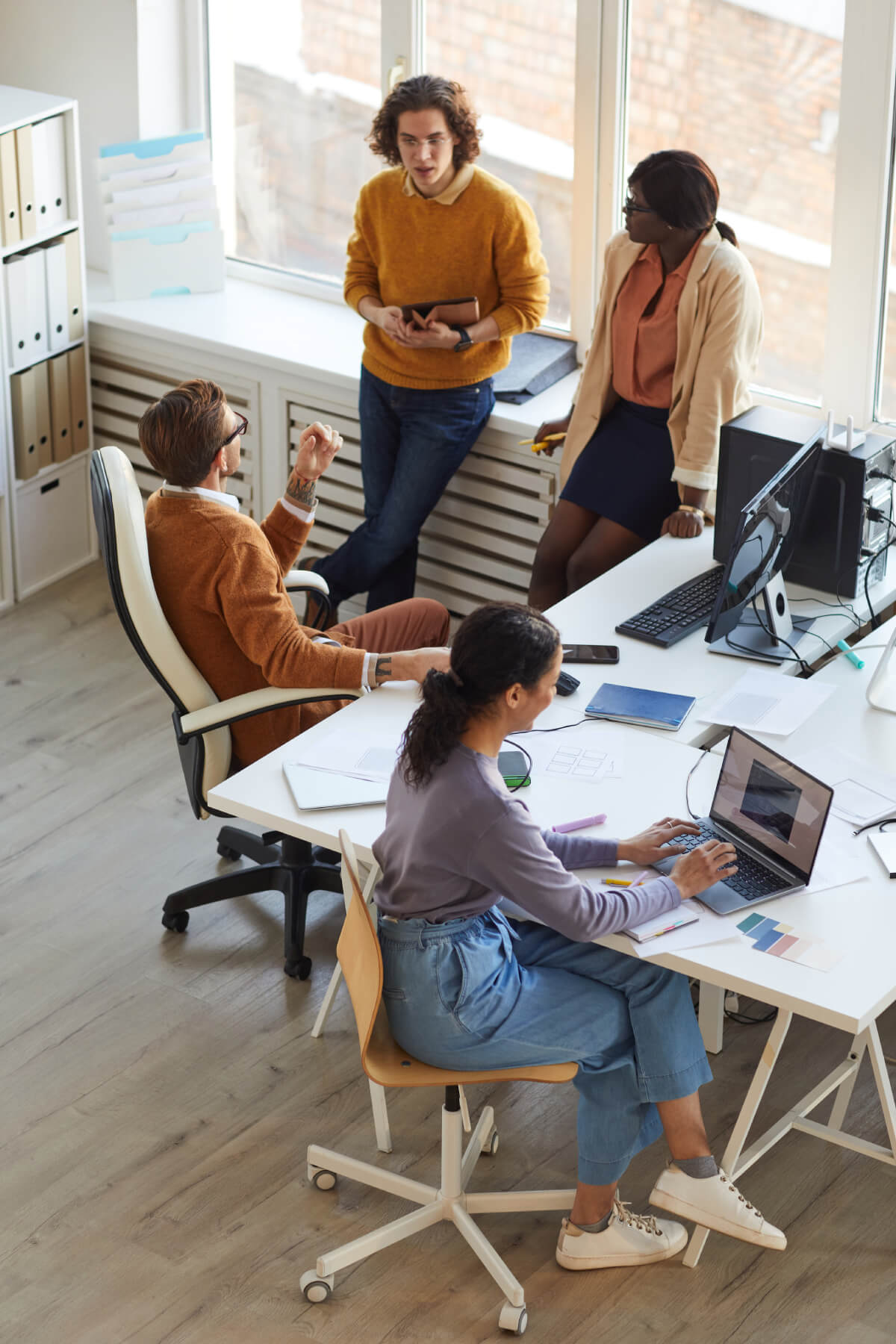 a group of people in an office